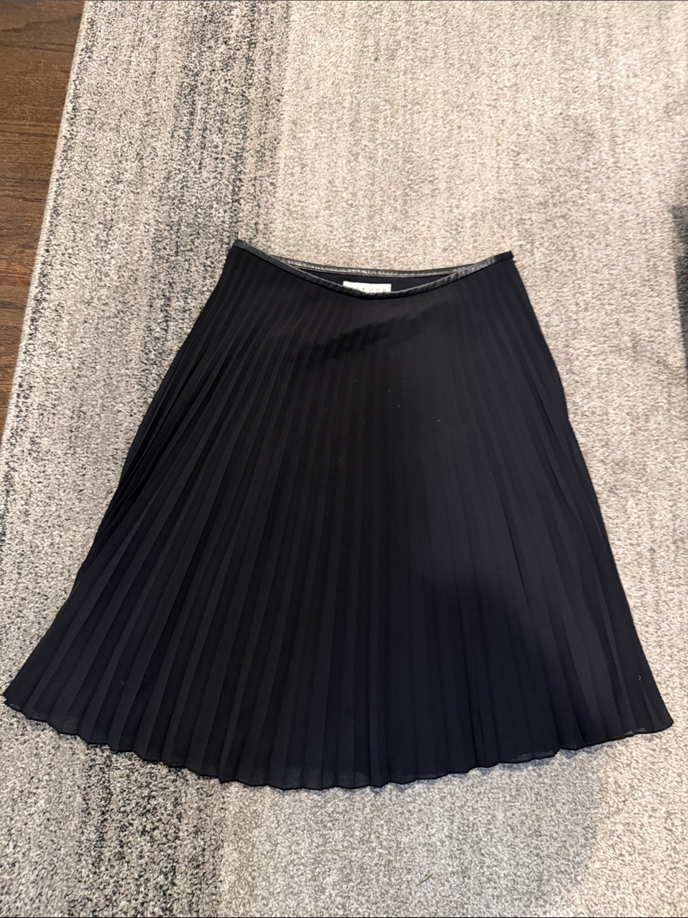 Elegant Black Pleated A-Line Skirt with leather trim by Jaeger size 10